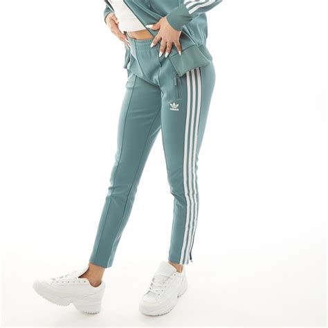 groene adidas broek dames